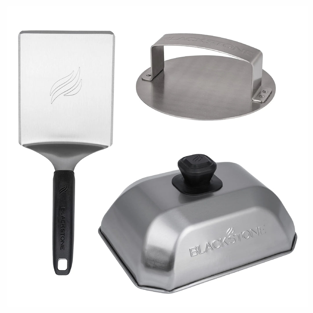 Blackstone Smash Burger Kit (3 Pieces) - A stainless steel burger kit featuring a hamburger spatula, basting dome, and burger press for crafting smash-style burgers with crispy edges and juicy centers, perfect for griddle enthusiasts.