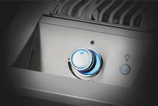 Napoleon Built-In 700 Series Single Range Top Burner with Stainless Steel Cover: a compact 10-inch premium stainless steel drop-in burner providing controlled heat for side cooking in outdoor kitchens.