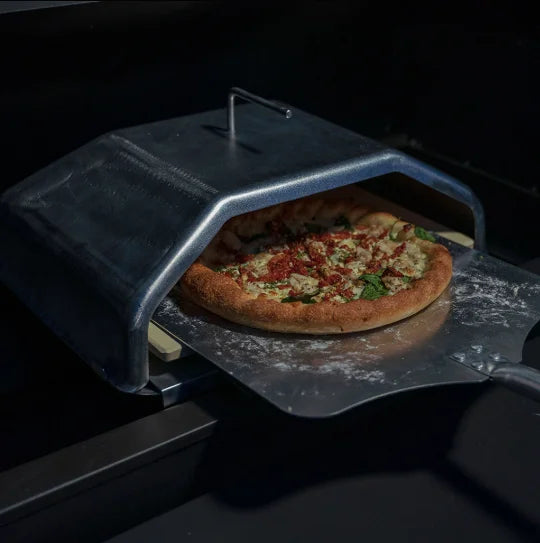 GMG Wood-Fired Pizza Attachment for PEAK/LEDGE Pellet Grills - Converts pellet grill into a high-heat wood-fired oven with temperatures up to 800°F for perfect pizzas in 2–4 minutes and versatile cooking options including bread baking and steak searing.