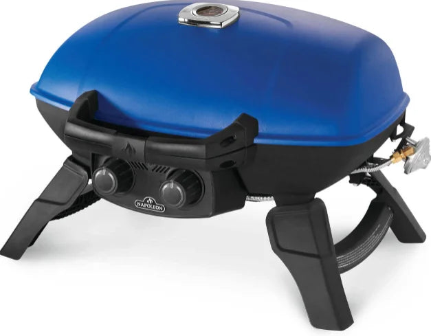 Napoleon TravelQ 285 portable gas grill in blue and red, featuring stainless steel burners, WAVE porcelain-coated cast iron grids, and folding legs for compact storage.