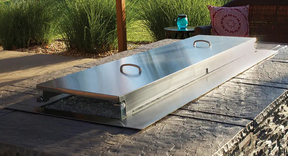 Carol Rose Collection 48" LED Linear Outdoor Firepit: Sleek stainless steel design combines with powerful heat output (55,000 BTUs) for a dramatic centerpiece in your custom fire table setup.
