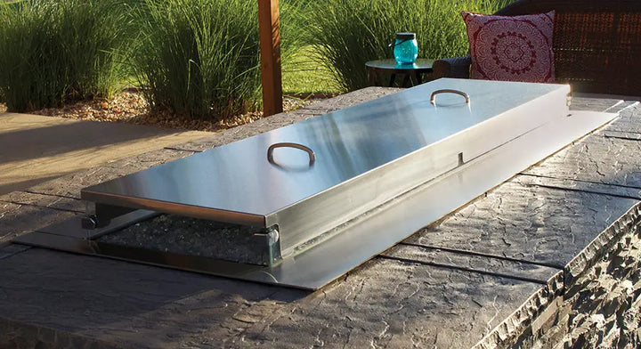 Carol Rose Collection 48" LED Linear Outdoor Firepit: Sleek stainless steel design combines with powerful heat output (55,000 BTUs) for a dramatic centerpiece in your custom fire table setup.