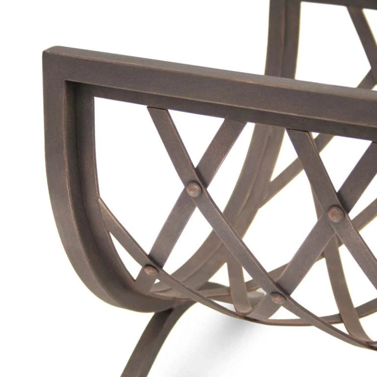 Pilgrim Iron Weave Log Holder: Elegant, hand-forged iron frame in distressed bronze finish, featuring intricate weave design for refined fireplace storage.