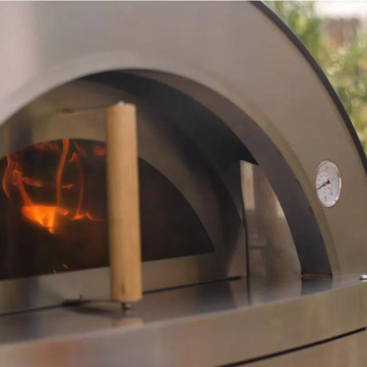 Forno Venetzia "Torino 500" Copper Outdoor Kitchen Oven - A handcrafted, freestanding oven with a large 32" × 24" cooking surface (768 sq. in.) accommodating up to four pizzas at once, featuring authentic Italian engineering, firebrick hearth, ceramic insulation, glass door, and durable copper dome finish.