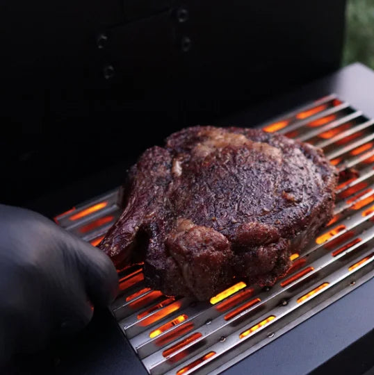 Green Mountain Grills SideBURN high-heat side sear station with infrared electric technology for rapid ignition and precise radiant heat.