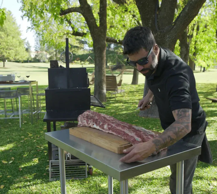 Tagwood Working Table - Stainless Steel: Durable stainless steel construction, premium 304 material, heavy-duty casters for easy mobility, ample 835 sq. in. prep area, sturdy worktop counter ideal for outdoor kitchens or grilling setups.