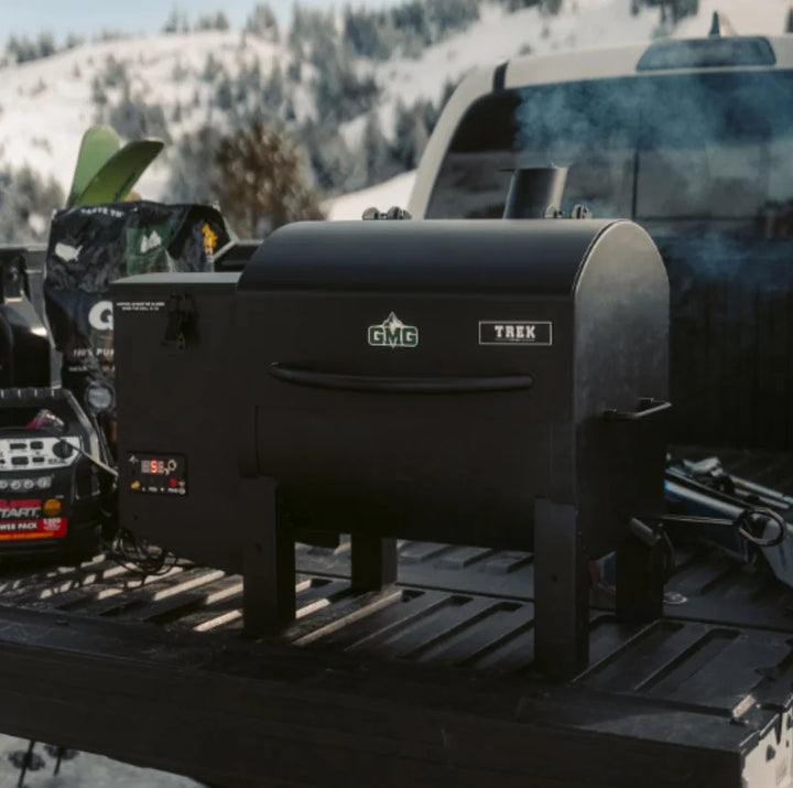 TREK PRIME 2.0 WiFi Smart Pellet Grill - A compact, portable wood-fired grill with WiFi control and versatile power options for precise cooking anywhere from 150 °F to 550 °F, featuring a hybrid chamber design and rugged construction for outdoor adventures.