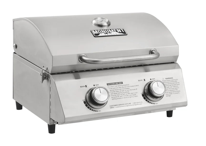 Monument Grills "13742" 2-Burner Tabletop Gas Grill - Classic Series: Compact stainless steel grill with two burners producing 15,000 BTU for even cooking on 207 sq. in. surface, perfect for patios, camping, and RV adventures.