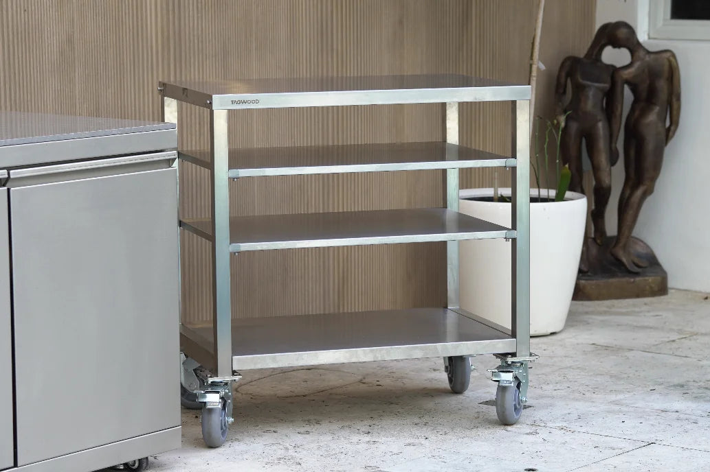 Tagwood Working Table - Stainless Steel features a durable premium 304 stainless steel construction, providing 835 sq. in. of spacious prep area for grilling essentials, with smooth-rolling casters and a sturdy worktop counter.