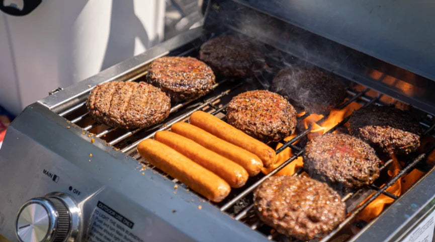 Monument Grills Classic Series 2-Burner Tabletop Gas Grill features premium stainless steel construction, dual burners delivering 15,000 BTUs, and compact design ideal for patios, camping trips, or tailgates.
