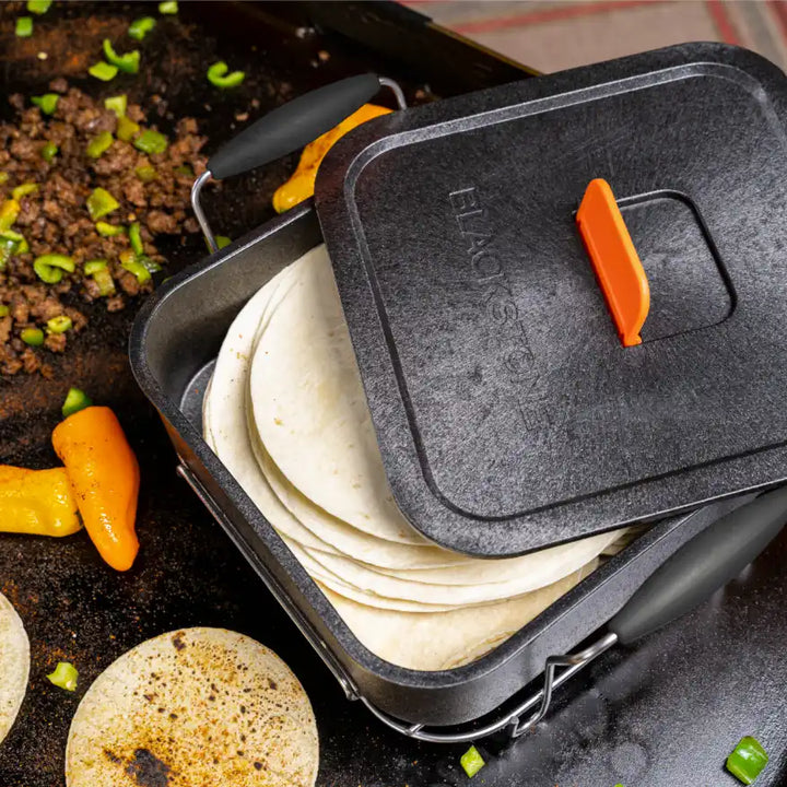 Blackstone Taco Kit: Complete serving kit for effortless taco assembly and organization, featuring a tortilla warmer, trivet, toppings tray, and wire taco racks.