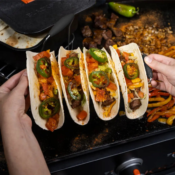 Blackstone Taco Kit: Complete taco serving set includes tortilla warmer trivet, warmer, toppings tray, and wire racks for effortless assembly and cleanup.