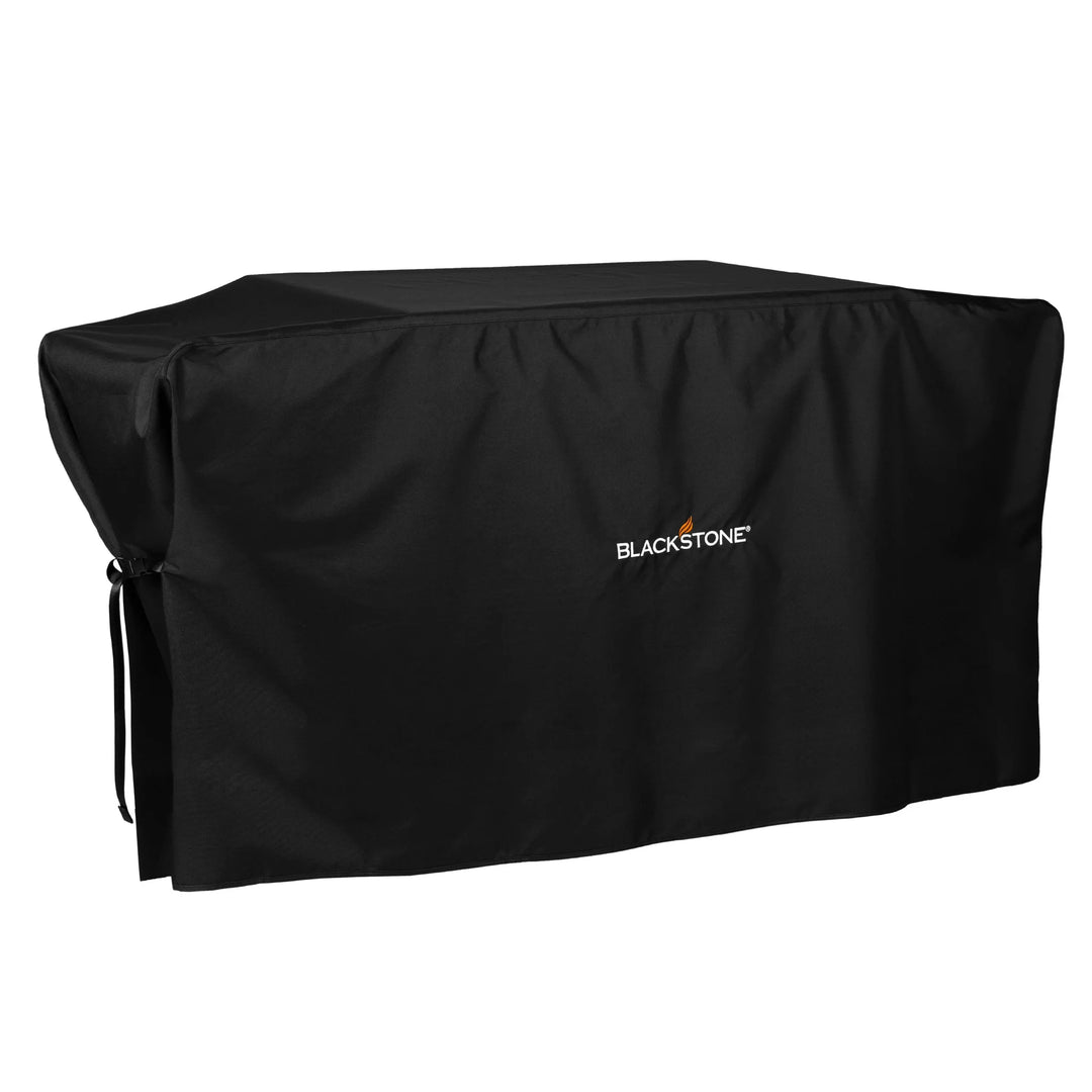 Blackstone 36” Griddle Cover for heavy-duty protection against sun, rain, wind, and snow, designed for 36” griddles with hood, featuring reinforced stitching and secure side buckles.