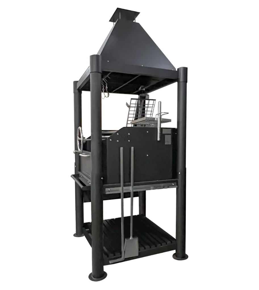 Tagwood "The Beast" Santa Maria Style Grill - Black: A heavy-duty, all-black Argentine firewood and charcoal grill featuring six distinct grilling surfaces, including dual adjustable grates, clamp grill, swivel grate, griddle, warming rack, and S-shaped meat hooks.