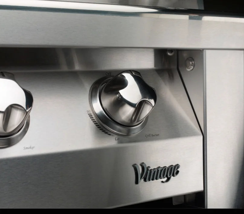 Vintage 56-Inch Built-In Gas Grill featuring four powerful 27,500 BTU stainless steel burners, dual infrared rotisserie burners, and dedicated smoker burner for authentic outdoor cooking performance.
