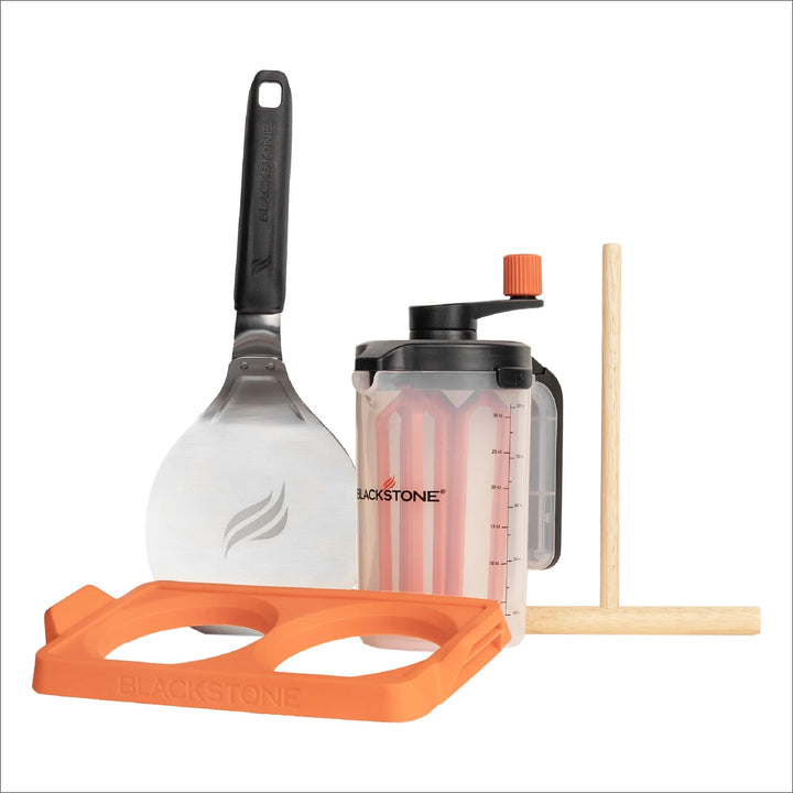 Blackstone Griddle Essentials Breakfast Kit (4 Pieces) - A comprehensive breakfast tool set featuring a round spatula, stir-and-pour batter mixer, crepe spreader, and 2-section egg ring tray for effortless morning meals.