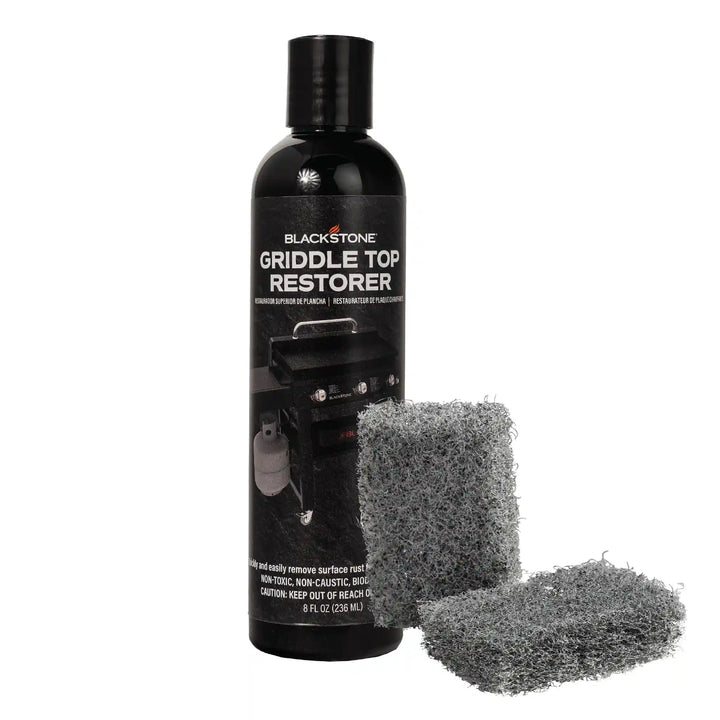 Blackstone Griddle Top Restoration Kit - Complete restoration kit for griddles, includes restorer and heavy-duty scrub pads for rust removal and surface cleaning.