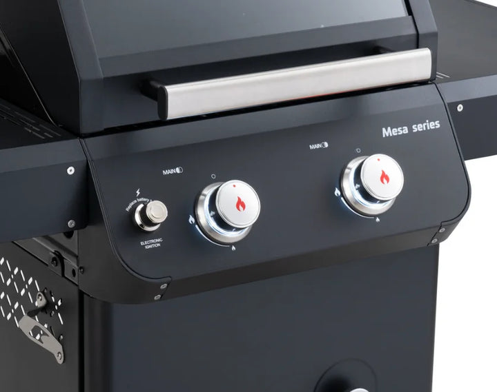 Compact Monument Grills Mesa Series M220 gas grill features two burners, producing up to 30,000 BTUs, with durable black powder-coated steel construction and rounded corner design for safe outdoor use.