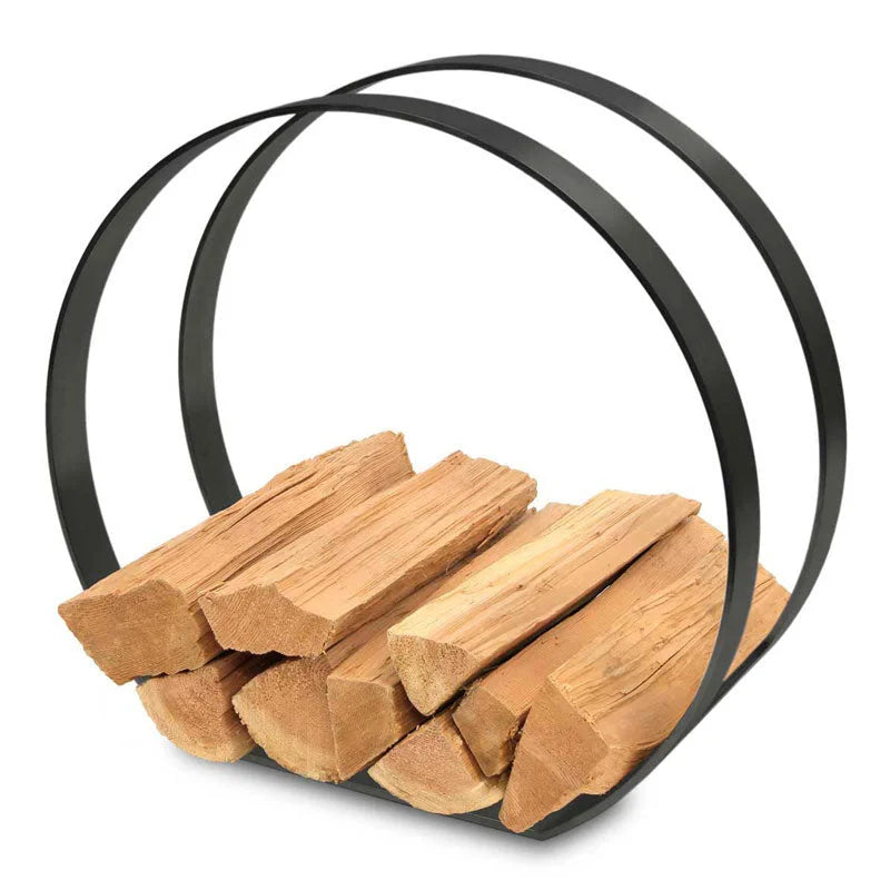 Modern log holder by Pilgrim, crafted from solid steel with precision-welded construction, featuring contemporary design and space-smart wood storage in sleek black finish.