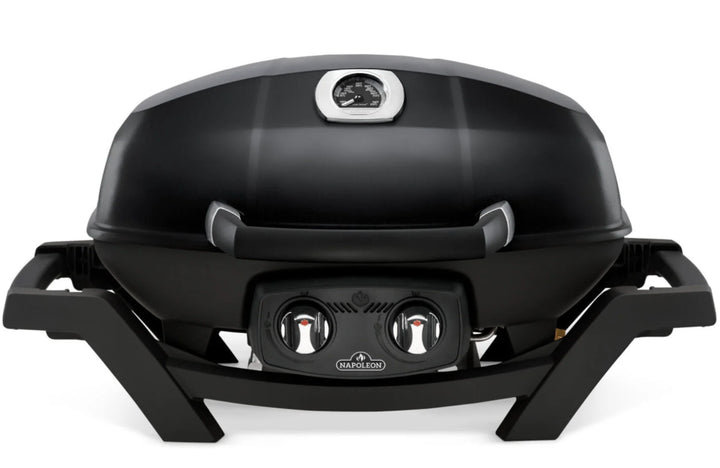 Napoleon TravelQ Pro285 portable gas grill features sleek all-black design, high-topped cast aluminum lid, dual stainless steel burners, and porcelainized cast iron WAVE grids for precise temperature control and gourmet-style cooking results.