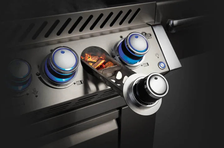 Napoleon Prestige Pro 825 Built-in Gas Grill featuring six stainless steel main burners, 106,000 BTU output, and expansive 1,245 sq. in. cooking area with infrared rear rotisserie burner.