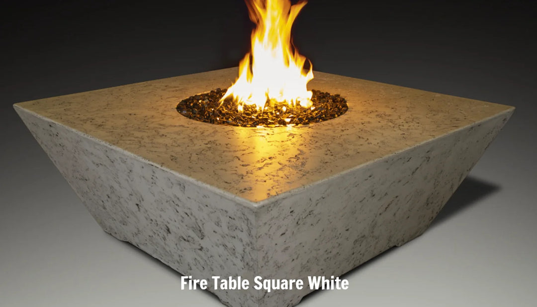Grand Canyon Olympus Square Fire Table: Modern, USA-made fire table with contemporary angled sides, generous tabletop surface, and radiant warmth for outdoor entertaining.