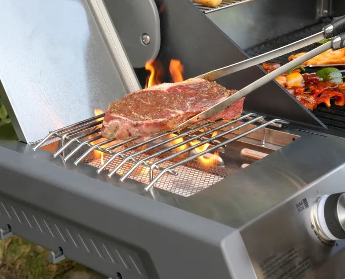 Monument Grills Eminence Series E405 gas grill features a sleek ClearView lid, smart LED touch panel, and premium finish, offering effortless control and consistent heat distribution.