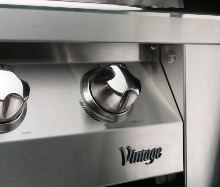 Vintage Grills 42-Inch Freestanding Gas Grill on Deluxe Cart features heliarc-welded stainless steel construction, three high-power burners, and an integrated smoker system for authentic wood-smoked flavor.