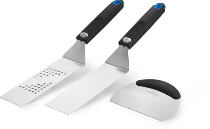 Napoleon Stainless Steel 3-Piece Plancha Toolset features premium stainless steel construction, including oversized solid spatula for delicate seafood, perforated spatula for burgers and fish, and versatile chopper/scraper for effortless dicing and cleanup.