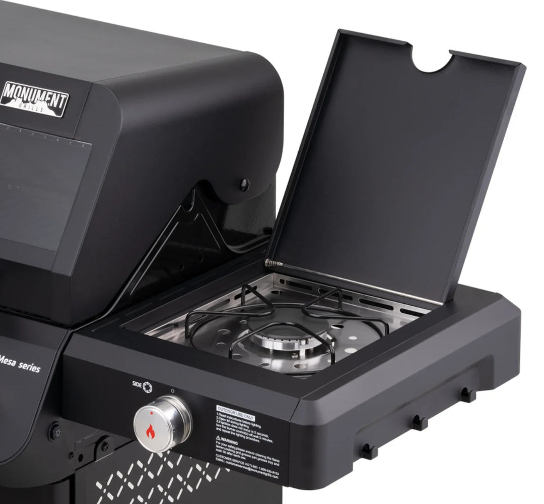 Monument Grills Mesa Series M325 compact 3-burner propane gas grill with black powder-coated steel exterior, porcelain-coated cast iron grates and individual burner knobs for precise temperature control.