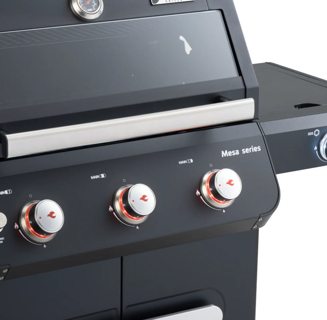 Monument Grills Mesa Series M325 3-Burner Gas Grill featuring black powder-coated steel construction, porcelain-coated cast iron grates, and precise temperature control for effortless grilling.