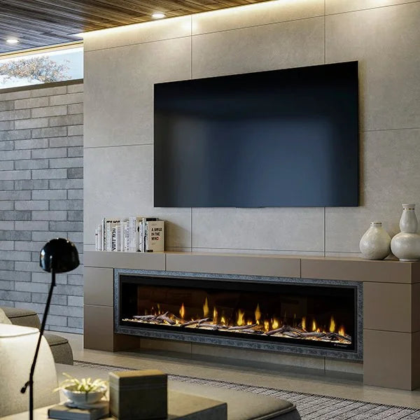 Dimplex Ignite Evolve 74" Built-in Electric Fireplace features Multi-Fire XD flames dancing across tumbled glass and driftwood, with sleek minimalist design and advanced personalization options.